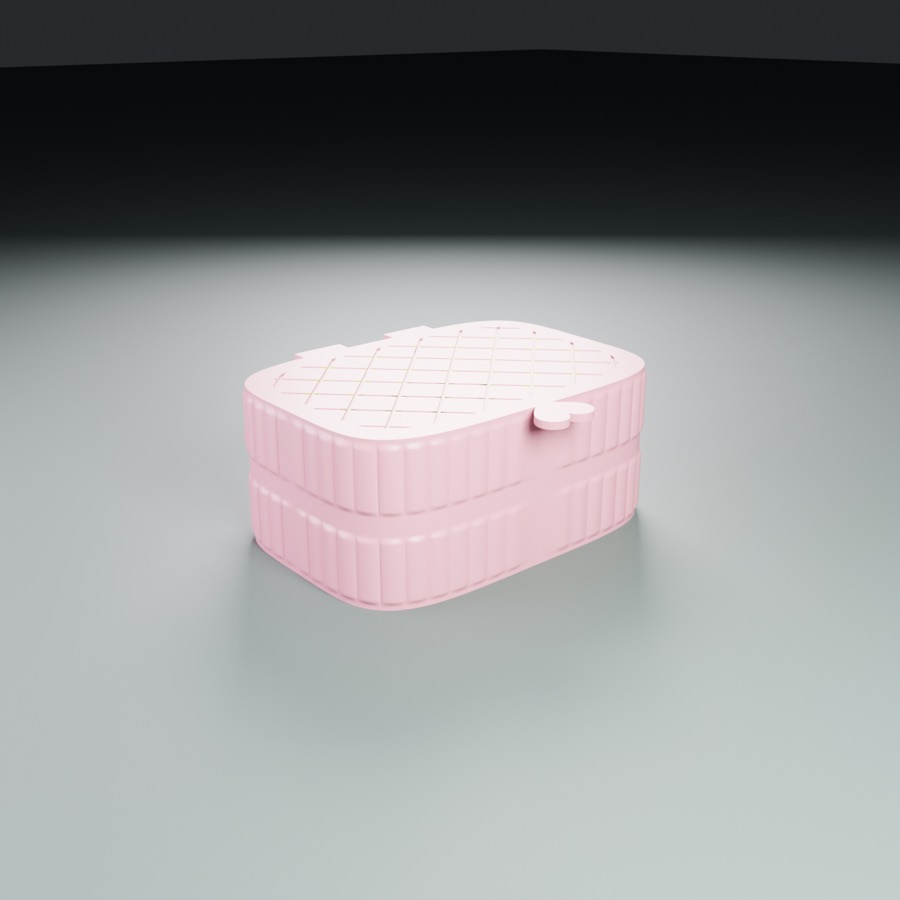 A pink jewellery box with a quilted lid