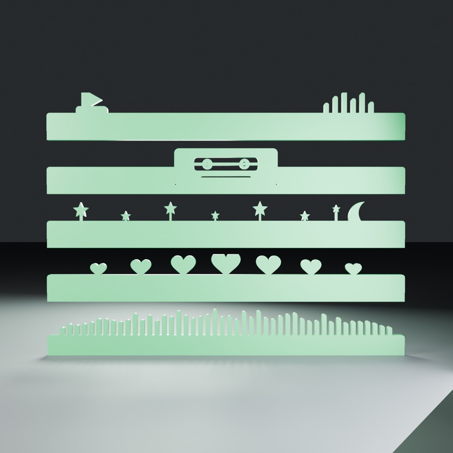 Five green shelf lips with different shapes along the top
