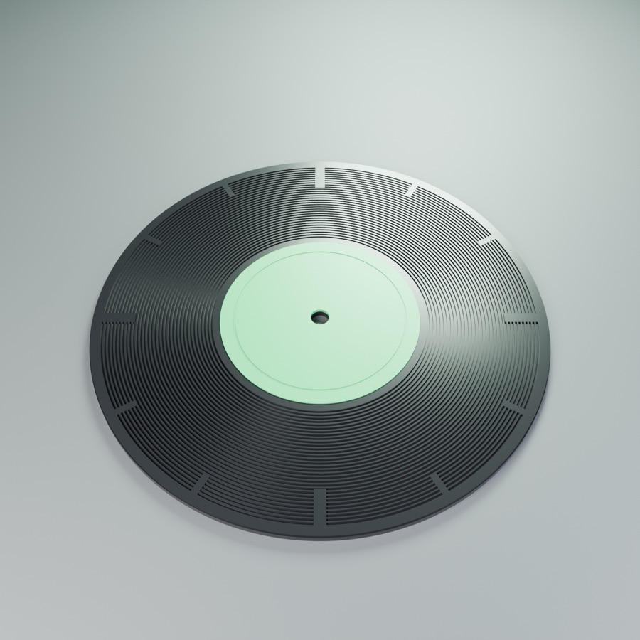A clock shaped like a black record with a green label