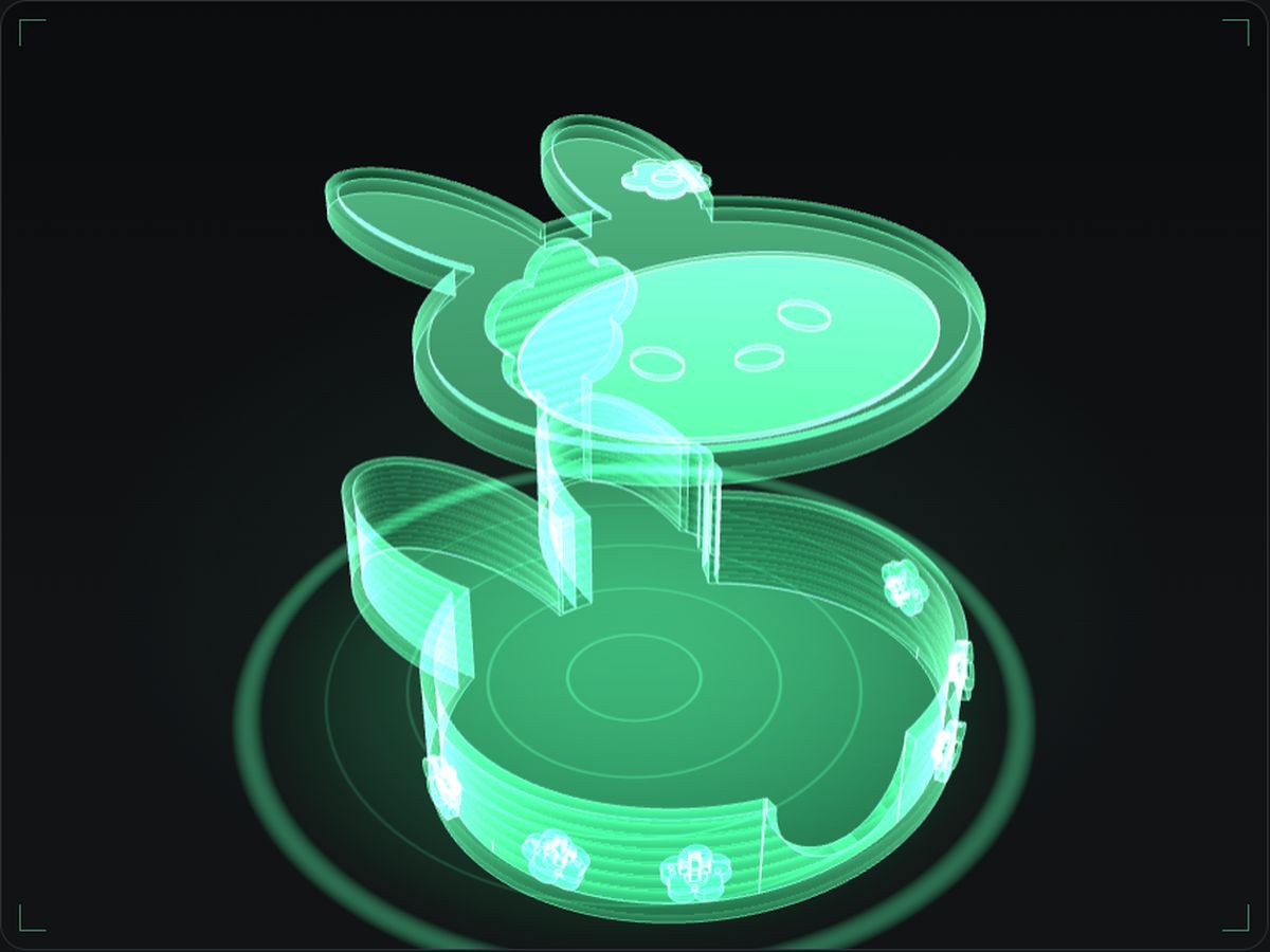 A green hologram of the bunny coaster set from the CAD model: the tall holder with six flower charms and a bunny coaster dropping into it.